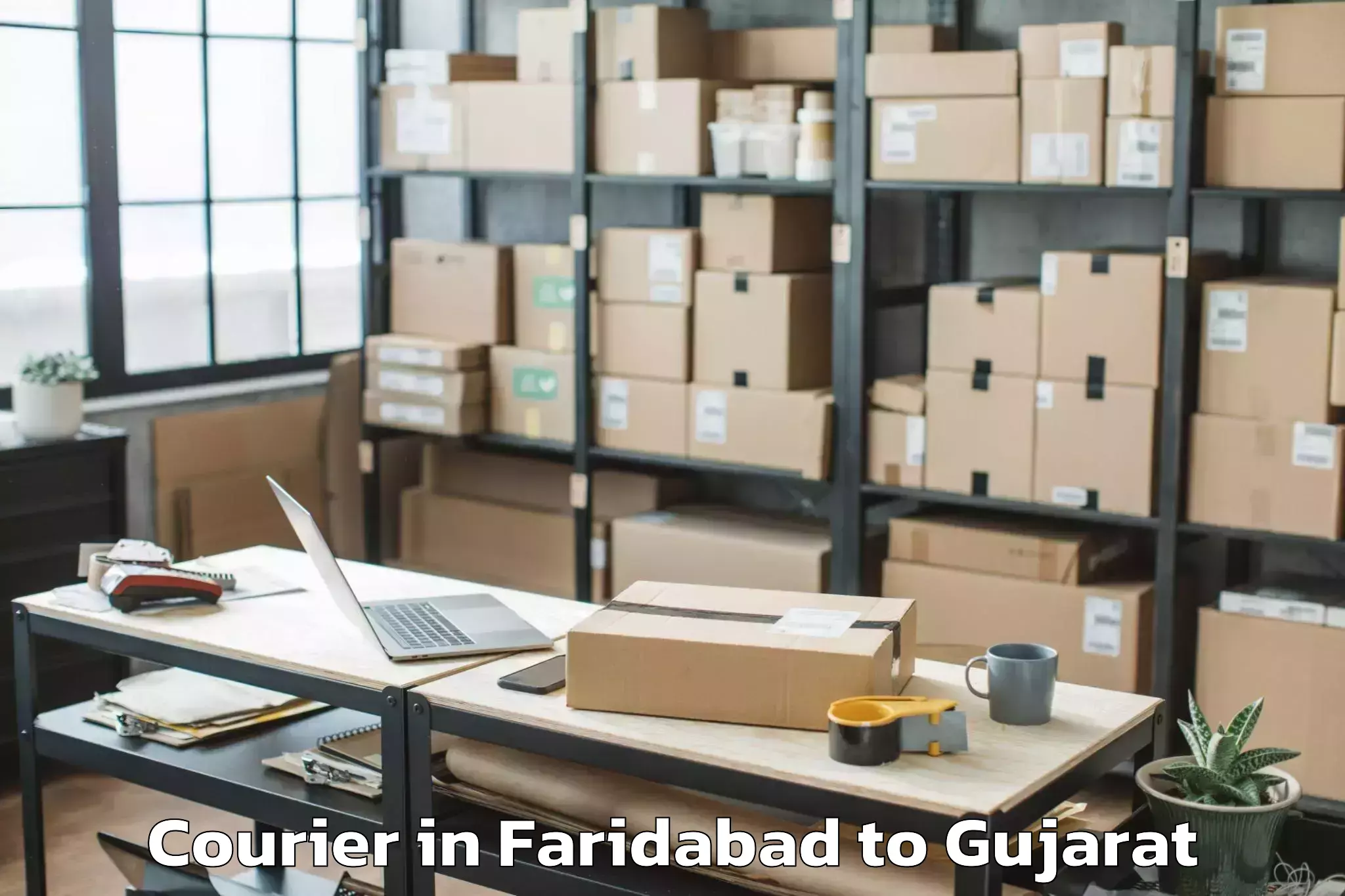 Professional Faridabad to Dhrol Courier